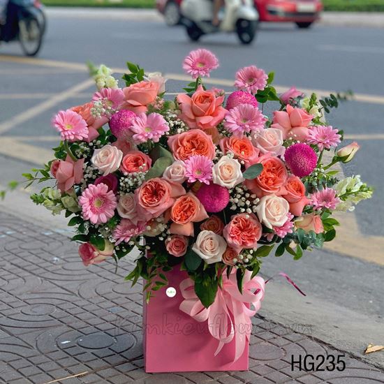 Lẵng hoa hồng cam lon don, đồng tiền nhí - HG235