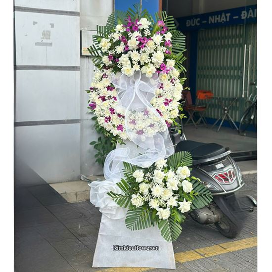 Vòng hoa chia buồn tone trắng tím - KV299