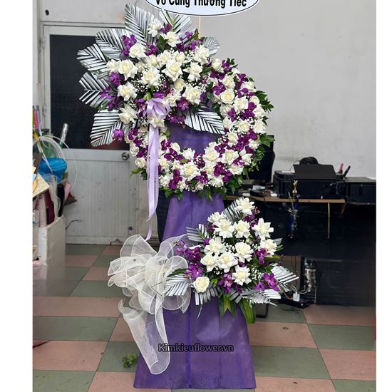 Vòng hoa chia buồn hồng trắng mix lan tím - KV312