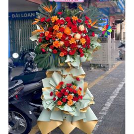 Kệ hoa chúc mừng tone đỏ mix cam - KH437