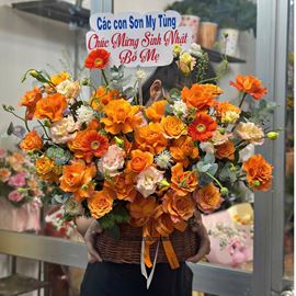 Giỏ hoa chúc mừng tone cam mix cát tường - HG893