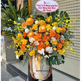 Bình hoa chúc mừng tone vàng cam mix lan hồ điệp - BI340