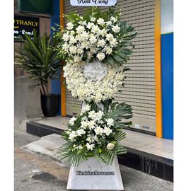 Vòng hoa chia buồn hồng trắng mix lan trắng - KV325