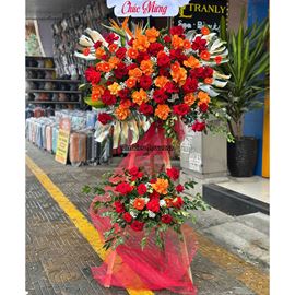 Kệ hoa chúc mừng tone đỏ cam mix thiên điểu - KH455