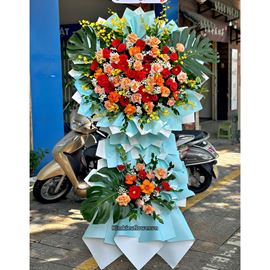 Kệ hoa chúc mừng tone đỏ cam mix lan vũ nữ - KH479