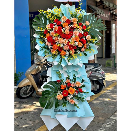 Kệ hoa chúc mừng tone đỏ cam mix lan vũ nữ - KH479