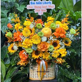 Giỏ hoa chúc mừng tone vàng  cam mix hướng dương - HG953