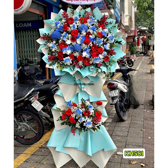 Picture of Kệ hoa chúc mừng tone đỏ xanh dương mix lan hồ điệp - KH581