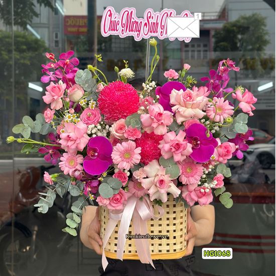 Picture of Giỏ hoa chúc mừng tone hồng mix lan hồ điệp tím - HG1068