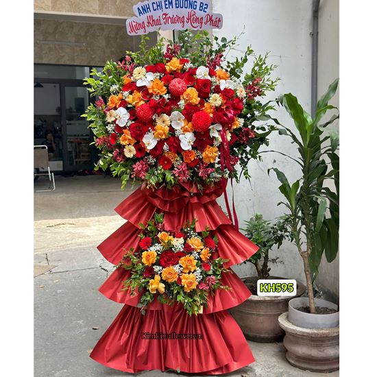 Picture of Kệ hoa chúc mừng tone đỏ cam mix lan hồ điệp trắng - KH595