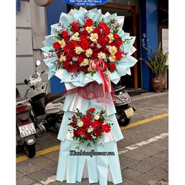 Kệ hoa chúc mừng tone đỏ, hoa hồng mix đồng tiền - KH322